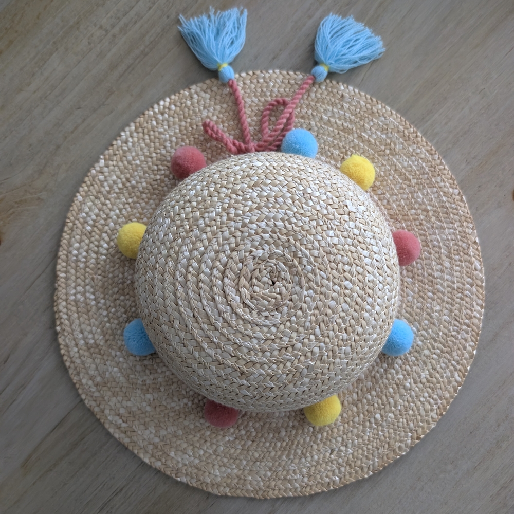 Straw Hat with Colorful Pom Poms